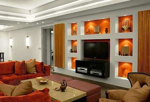 Ниша из гипсокартона под телевизор с дополнительными полками